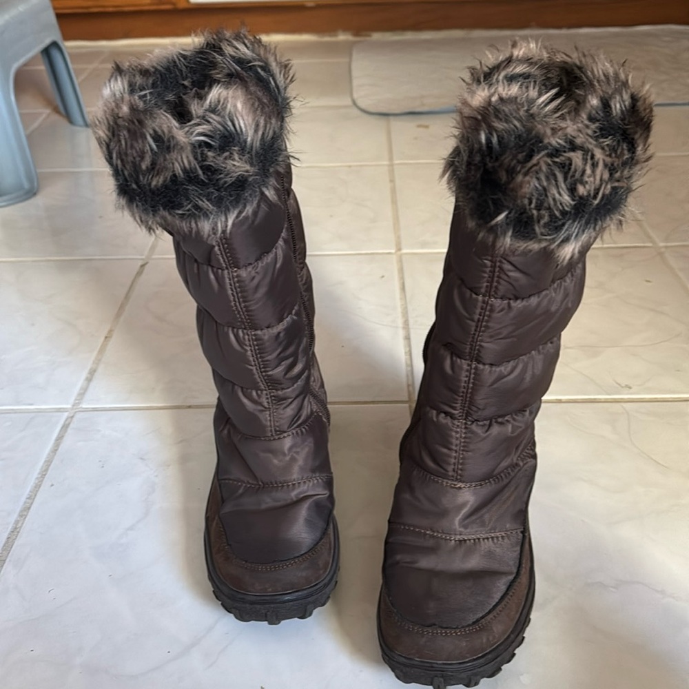 Spring Step. The brown mid-calf boots size 6.5 to 7